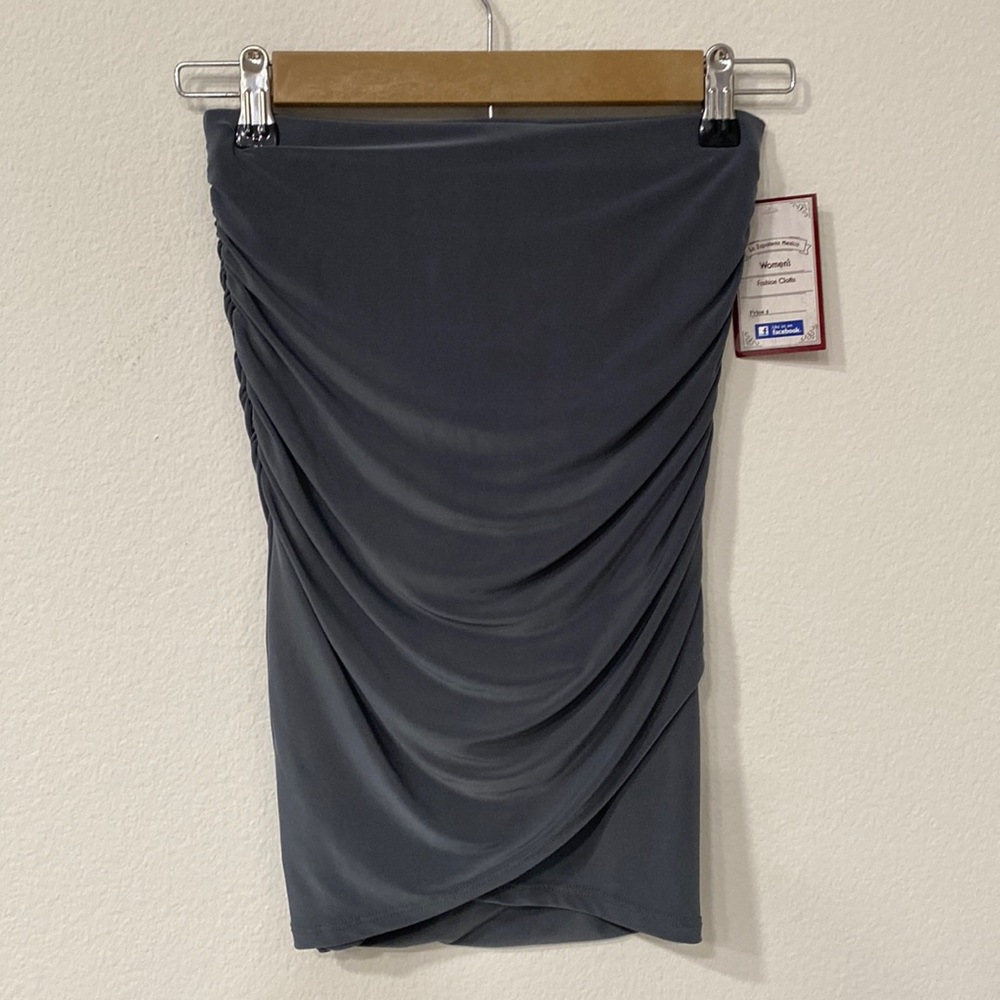 Dark green size small two-piece skirt, crop top never and been used tags on